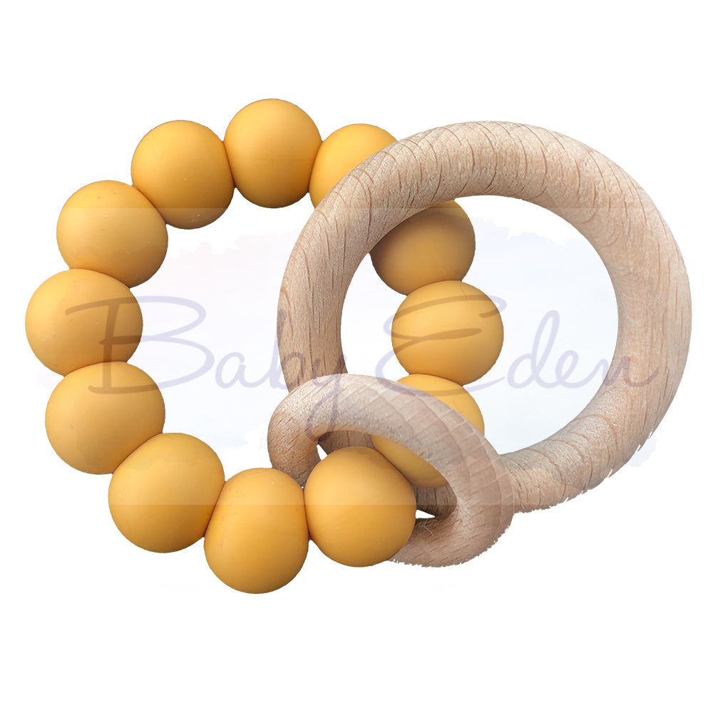 Mustard Silicone & Wood Small Rattle at Baby Eden