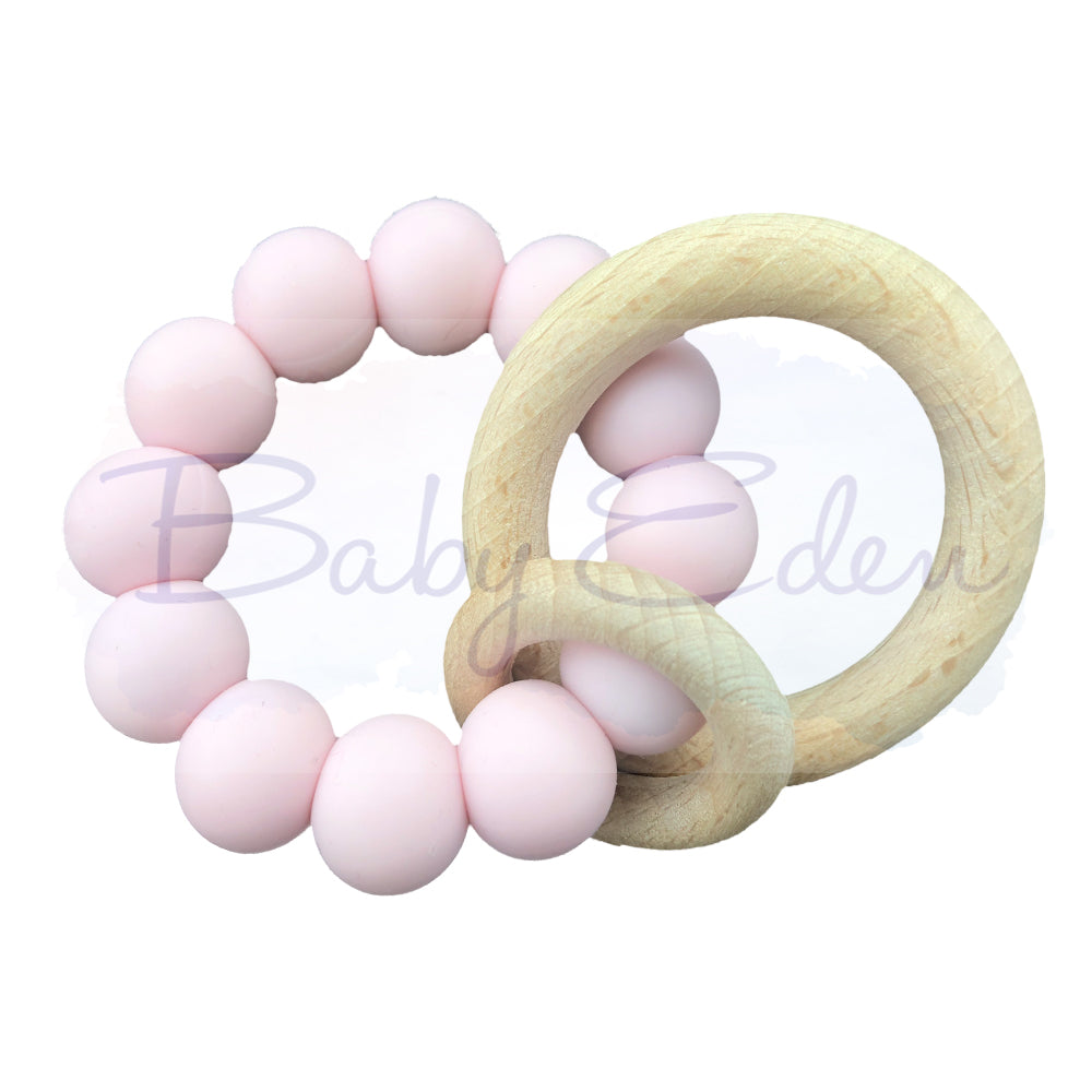 Pink Silicone & Wood Small Rattle at Baby Eden